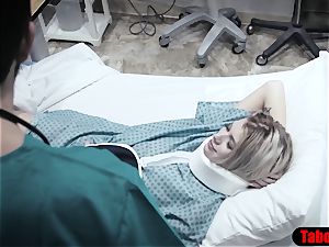 medic gives patient a sponge bath and vaginal study