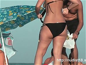 nude beach spycam video of super-steamy playful nudists in water